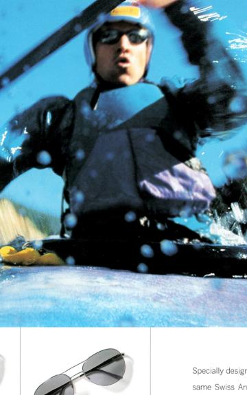 A person kayaking through water, photographed with a motion blur effect.